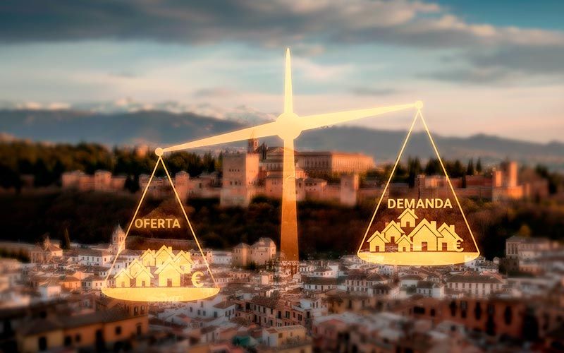 Balanza representando el equilibrio entre oferta y demanda en el mercado inmobiliario en Granada